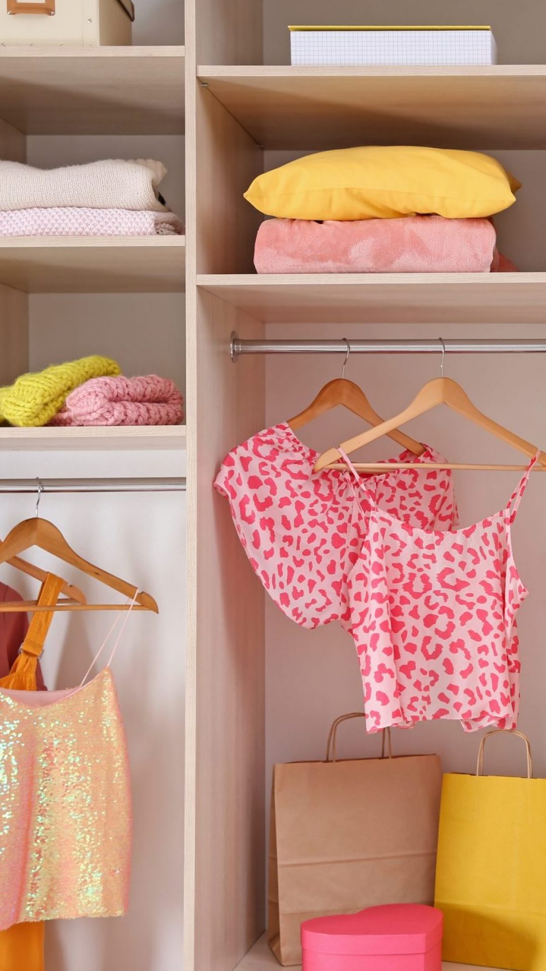 Woman,Choosing,Clothes,From,Large,Wardrobe,Closet